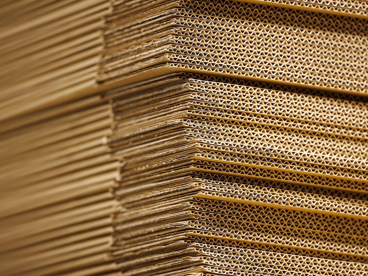 A stack of flattened shipping cartons. Photo: Henry Söderlund, CC BY 2.0, via Wikimedia Commons